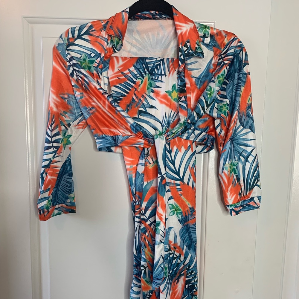 Orange and teal two piece top and leggings set